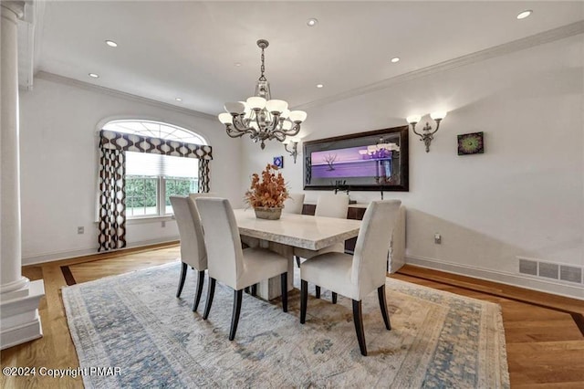 187 Eisenhart Blvd, Bangor, PA 18013 - dining area with crown molding, a chandelier, baseboards, wood finished floors, and recessed lighting