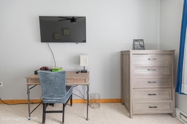 office space with light carpet and baseboards