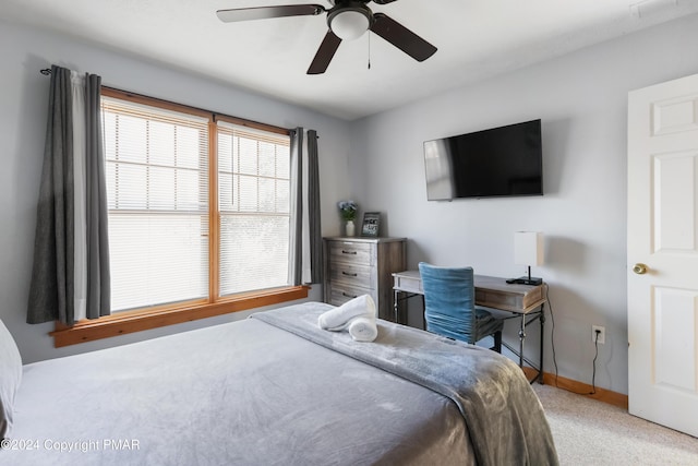 bedroom featuring carpet flooring, ceiling fan, and baseboards