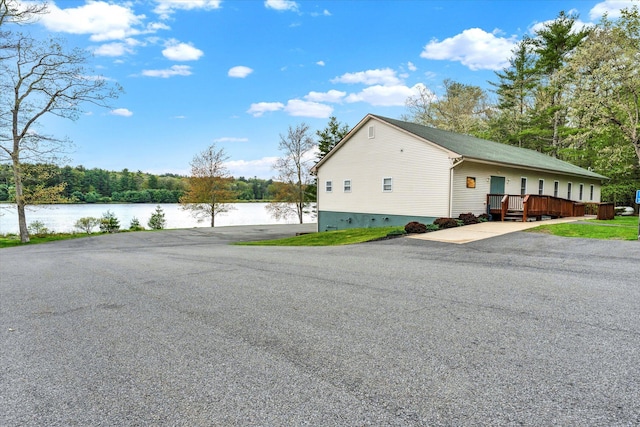 146 Bernadette Dr, Dingmans Ferry, PA 18328 - view of side of property featuring a deck with water view and crawl space