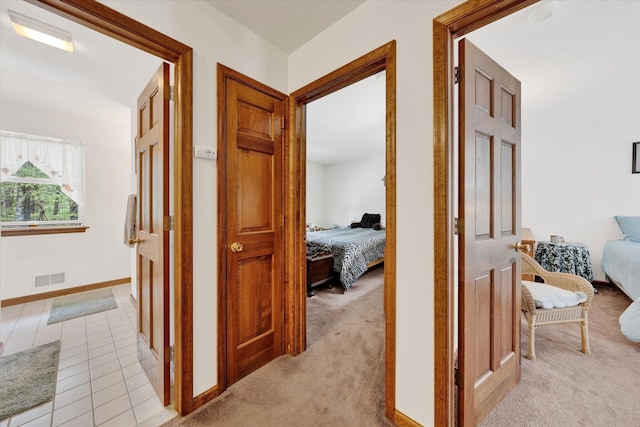 146 Bernadette Dr, Dingmans Ferry, PA 18328 - hallway with light carpet and baseboards