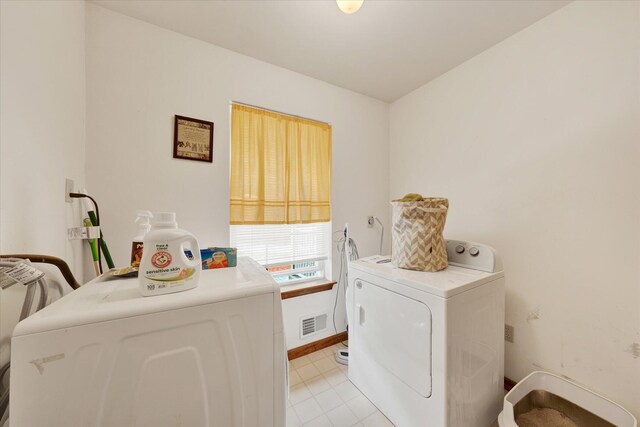 146 Bernadette Dr, Dingmans Ferry, PA 18328 - washroom with independent washer and dryer, light tile patterned flooring, and baseboards
