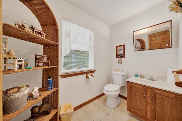 146 Bernadette Dr, Dingmans Ferry, PA 18328 - bathroom featuring toilet, tile patterned flooring, baseboards, and vanity
