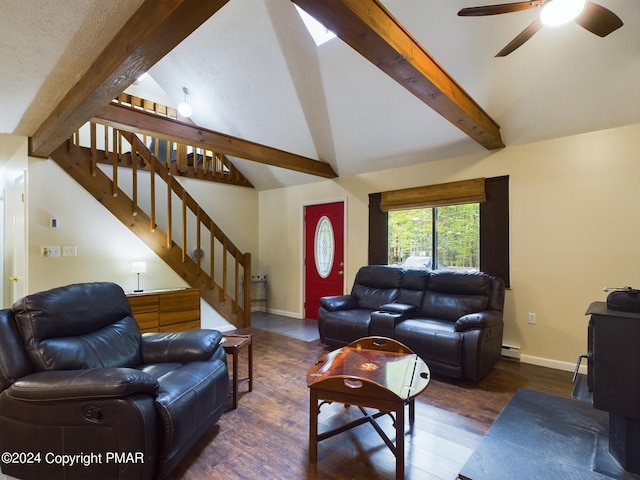 living area with stairway, lofted ceiling with beams, a baseboard heating unit, wood finished floors, and baseboards