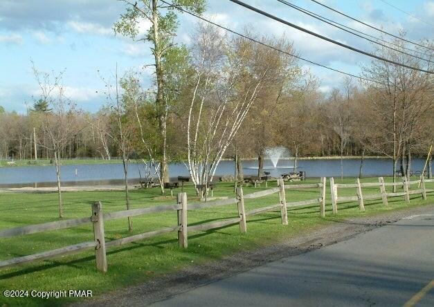 view of street featuring a water view