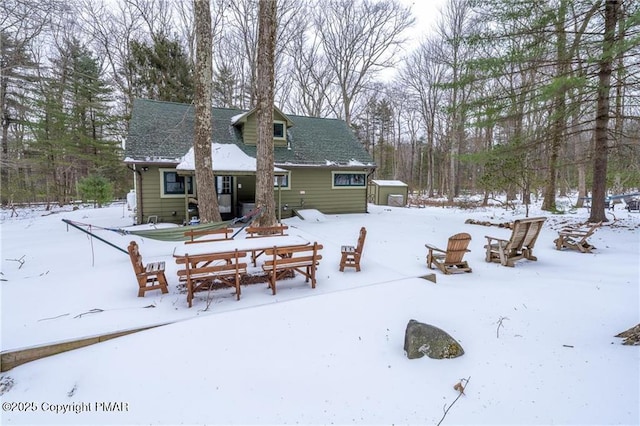 view of snow covered property