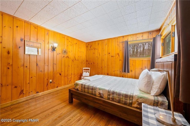 bedroom with light hardwood / wood-style floors