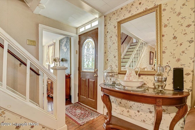 7714 Cherry Valley Rd, Delaware Water Gap, PA 18327 - entryway with wallpapered walls, stairs, and wood finished floors