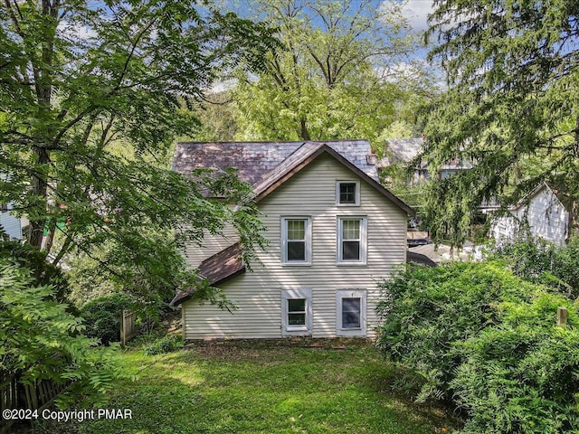 7714 Cherry Valley Rd, Delaware Water Gap, PA 18327 - rear view of property with a lawn