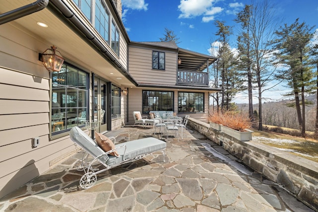 view of patio / terrace featuring a balcony