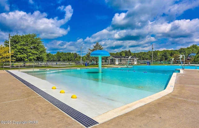 community pool with fence