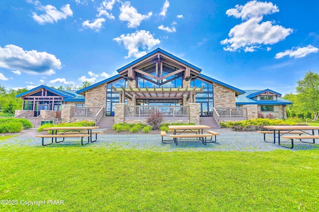174 Bushkill Dr, Pocono Lake, PA 18347 - view of property's community with a lawn and a deck