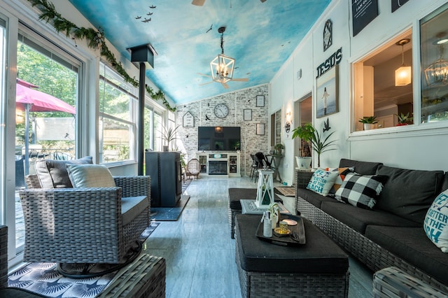 9 Hickory Dr, East Stroudsburg, PA 18301 - living room featuring lofted ceiling, healthy amount of natural light, and a chandelier