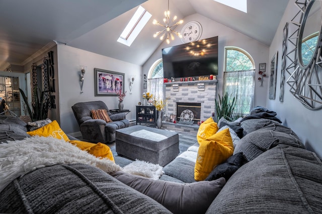 9 Hickory Dr, East Stroudsburg, PA 18301 - living room with a skylight, healthy amount of natural light, wood finished floors, high vaulted ceiling, and a brick fireplace
