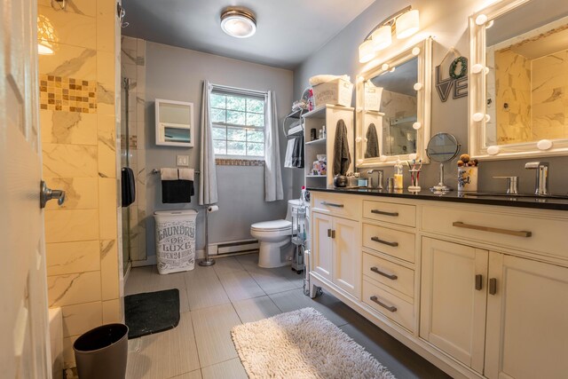 9 Hickory Dr, East Stroudsburg, PA 18301 - bathroom featuring a baseboard radiator, a shower with door, and double vanity