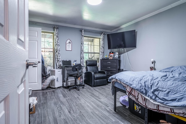 9 Hickory Dr, East Stroudsburg, PA 18301 - bedroom featuring wood finished floors, multiple windows, crown molding, and an office area