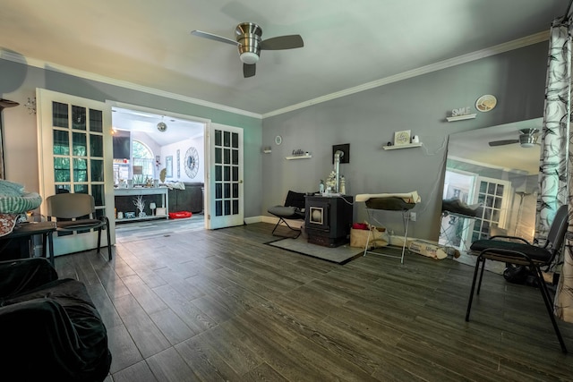 9 Hickory Dr, East Stroudsburg, PA 18301 - sitting room with a ceiling fan, a wood stove, wood finished floors, ornamental molding, and french doors
