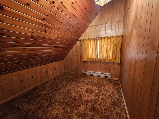 130 Michigana Dr, Pocono Lake, PA 18347 - additional living space with carpet floors, wood walls, lofted ceiling, and a baseboard radiator