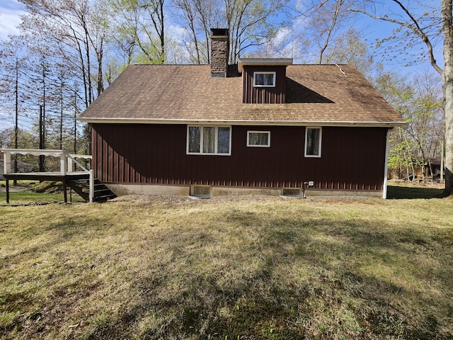 130 Michigana Dr, Pocono Lake, PA 18347 - view of side of property featuring a lawn and a chimney