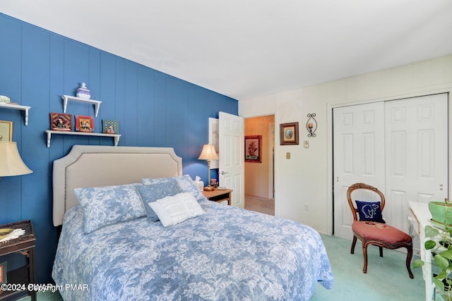 carpeted bedroom featuring a closet