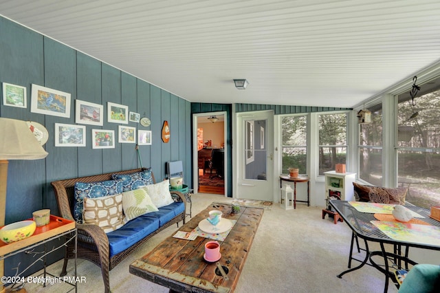 sunroom / solarium with vaulted ceiling