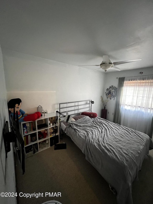 bedroom with carpet flooring and a ceiling fan