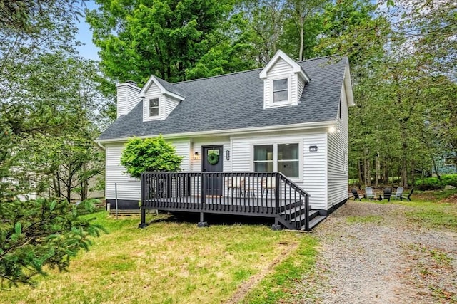 2039 Skyview Ter, Tobyhanna, PA 18466 - new england style home with a deck, roof with shingles, a front lawn, view of scattered trees, and a chimney
