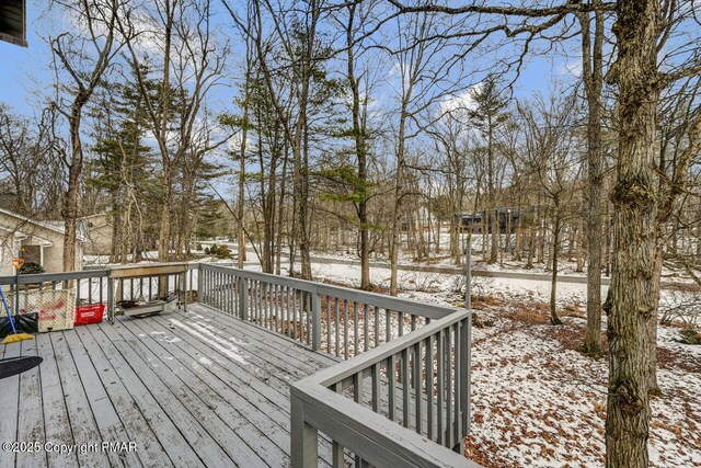 view of snow covered deck