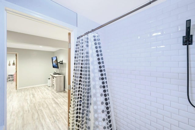 5117 Hounds Ear Rd, Tobyhanna, PA 18466 - full bathroom featuring tiled shower and wood finished floors