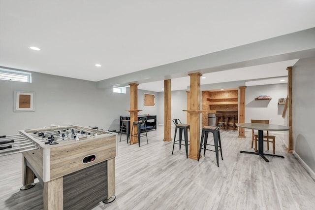5117 Hounds Ear Rd, Tobyhanna, PA 18466 - playroom featuring light wood finished floors, recessed lighting, and bar area