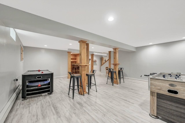 5117 Hounds Ear Rd, Tobyhanna, PA 18466 - recreation room featuring wood finished floors, recessed lighting, a baseboard radiator, and bar area