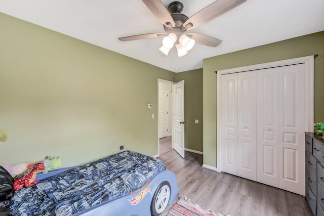 5117 Hounds Ear Rd, Tobyhanna, PA 18466 - bedroom with wood finished floors, a closet, and ceiling fan