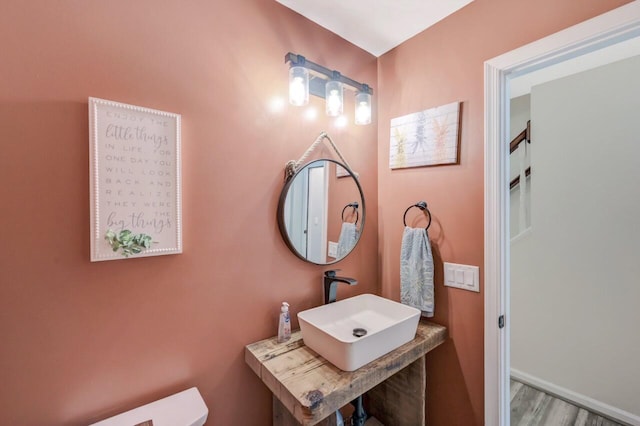 5117 Hounds Ear Rd, Tobyhanna, PA 18466 - bathroom featuring a sink and wood finished floors