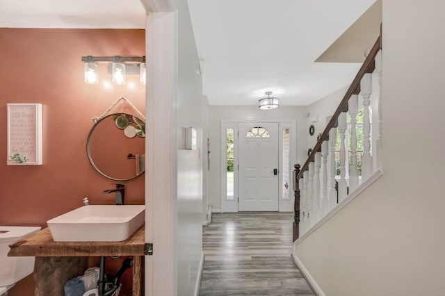 5117 Hounds Ear Rd, Tobyhanna, PA 18466 - foyer entrance featuring plenty of natural light, stairway, and wood finished floors