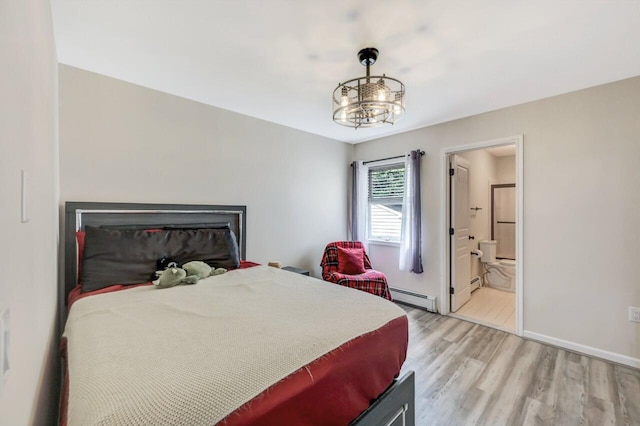 5117 Hounds Ear Rd, Tobyhanna, PA 18466 - bedroom featuring baseboard heating, light wood-style floors, a chandelier, and connected bathroom
