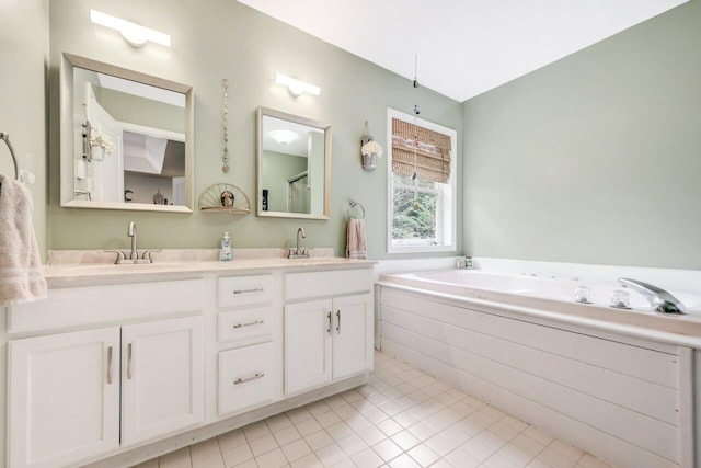 5117 Hounds Ear Rd, Tobyhanna, PA 18466 - full bathroom featuring double vanity, tile patterned flooring, and a bath