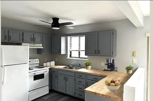 3073 Briarwood Dr, Tobyhanna, PA 18466 - kitchen featuring a sink, white appliances, light countertops, a peninsula, and gray cabinetry