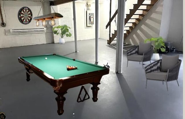 3073 Briarwood Dr, Tobyhanna, PA 18466 - playroom featuring a baseboard heating unit, billiards, and finished concrete floors