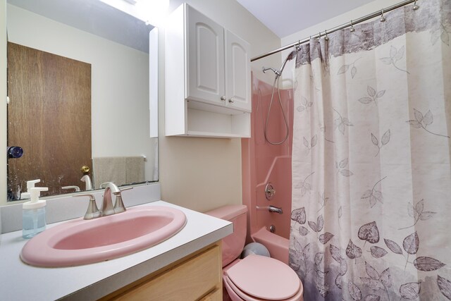 203 Wyomissing Dr, Pocono Lake, PA 18347 - full bathroom featuring vanity, shower / bathtub combination with curtain, and toilet