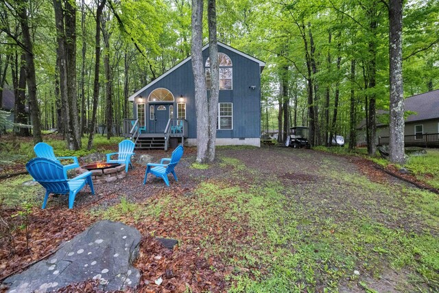 203 Wyomissing Dr, Pocono Lake, PA 18347 - back of house featuring a fire pit, crawl space, and a wooden deck