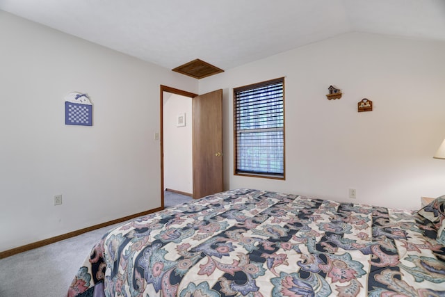 203 Wyomissing Dr, Pocono Lake, PA 18347 - carpeted bedroom with vaulted ceiling and baseboards