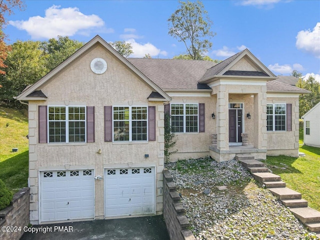 view of front of home with a garage