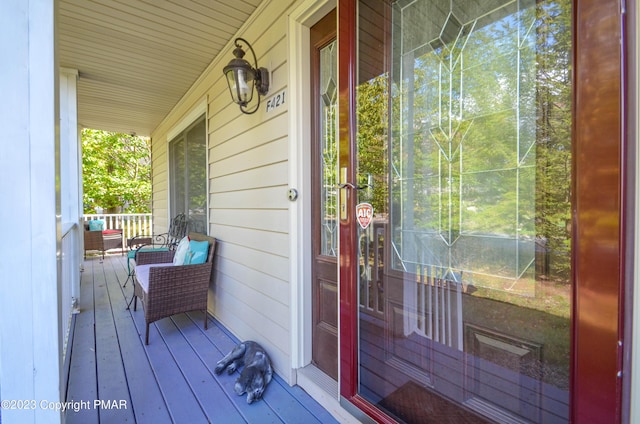 wooden deck featuring a porch