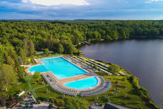 297 Rte 423, Pocono Pines, PA 18350 - aerial view of property's location featuring a pool, a forest, and a nearby body of water