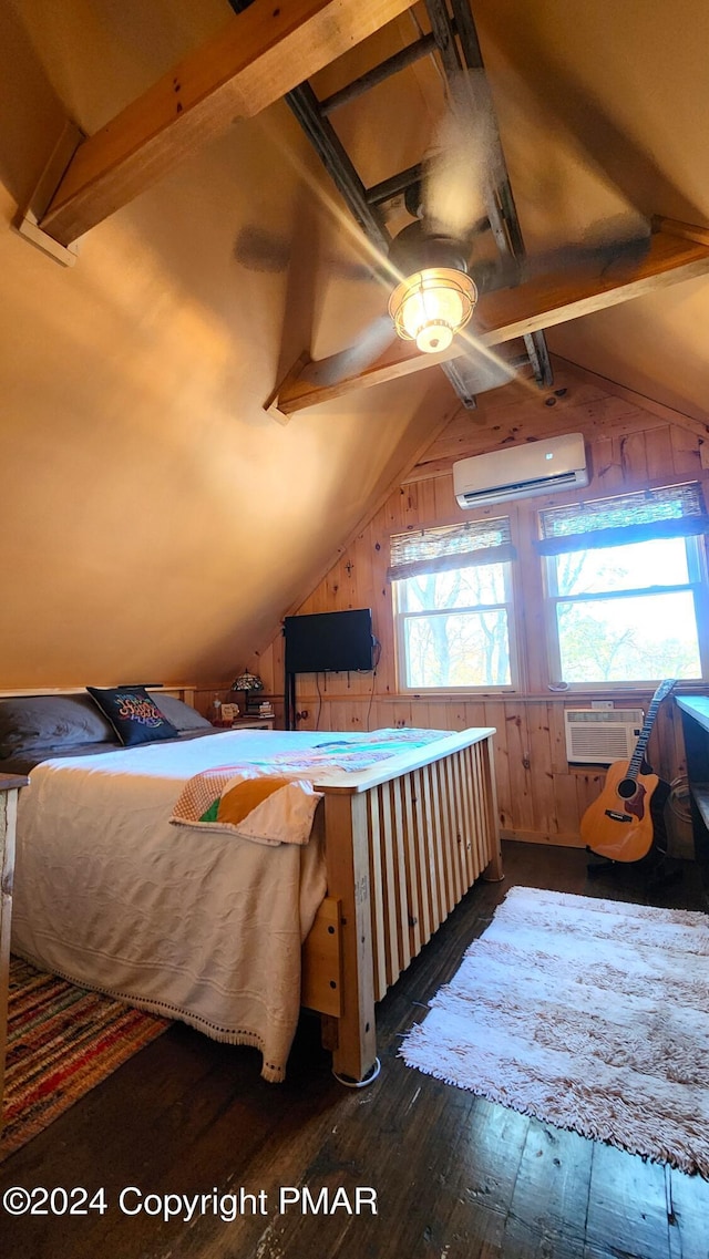 2124 Meadowlark Cir, Bushkill, PA 18324 - bedroom featuring dark wood-style floors, vaulted ceiling, a wall mounted air conditioner, and wooden walls