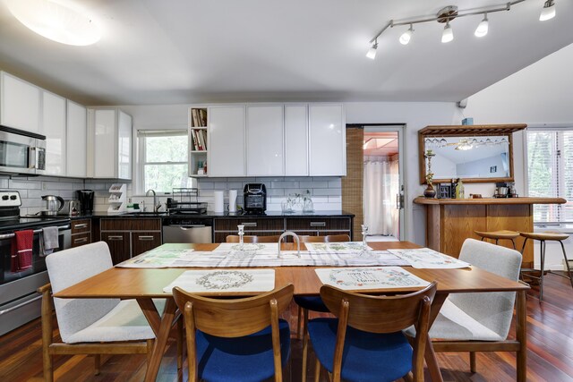 7042 Vista Dr, Tobyhanna, PA 18466 - kitchen featuring appliances with stainless steel finishes, white cabinets, and dark countertops