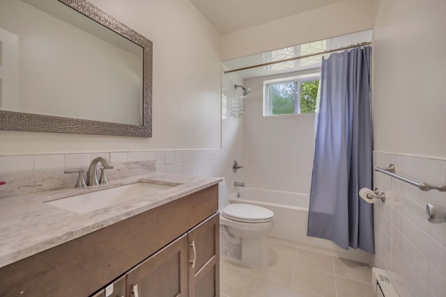 233 Vista Rd, Cresco, PA 18326 - full bath featuring tile walls, vanity, shower / tub combo with curtain, tile patterned floors, and a wainscoted wall