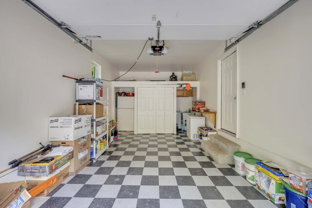 233 Vista Rd, Cresco, PA 18326 - garage with freestanding refrigerator and a garage door opener