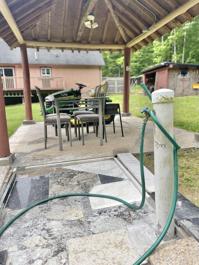 233 Vista Rd, Cresco, PA 18326 - view of patio / terrace with outdoor dining space, a gazebo, and a ceiling fan