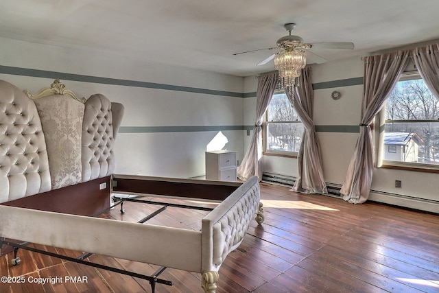 bedroom with wood-type flooring and ceiling fan